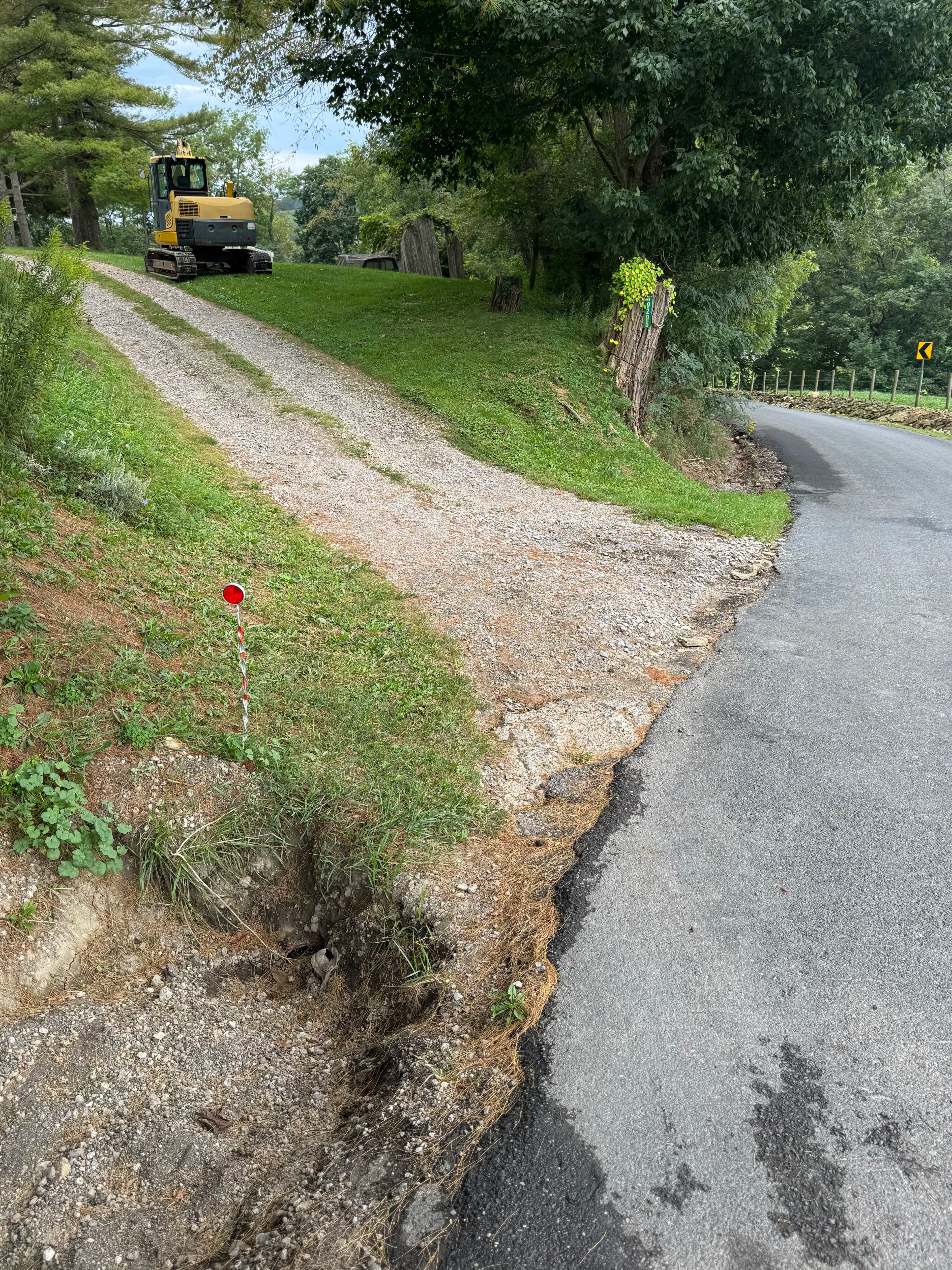 Project Gravel Driveway Drainage Fix with Culvert and Rip Rap image